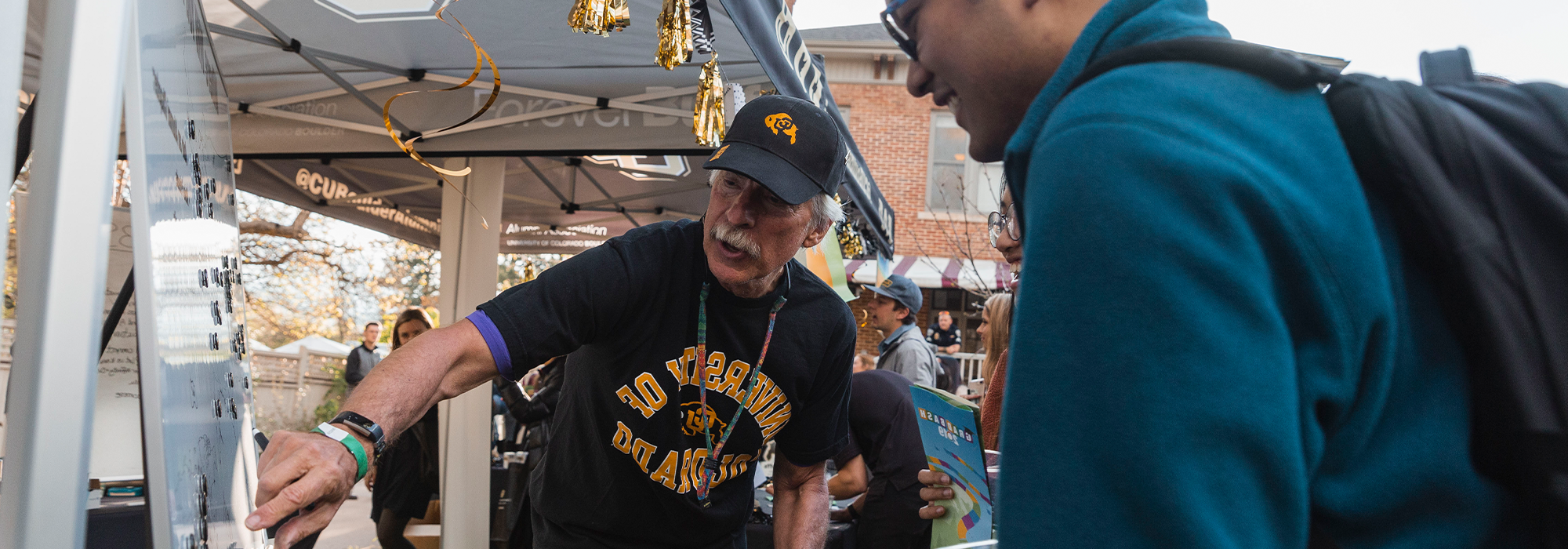 Volunteers helping students at an event