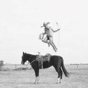 Mexican rodeo performer with horse